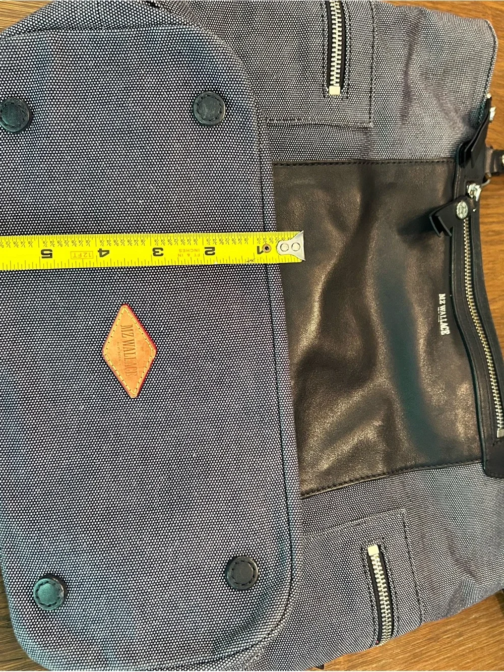 MZ Wallace navy canvas tote with leather pocket and handles